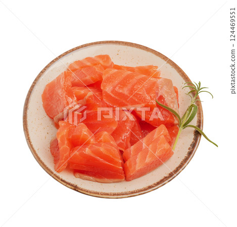 Salmon fish pieces in a plate and rosemary isolate on white. 124469551
