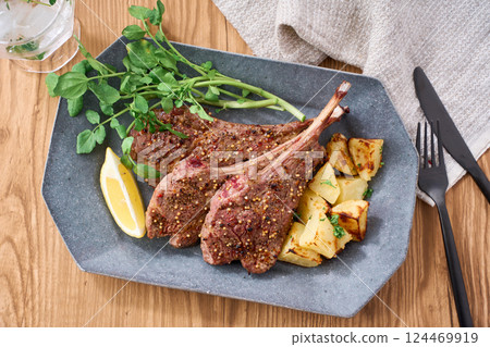Lamb chop steak with watercress and potatoes Lamb chop steak with watercress and potatoes 124469919