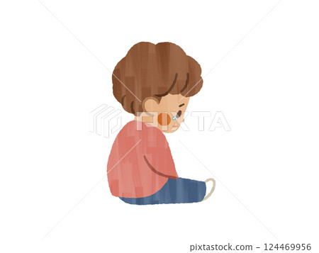 一個男孩低頭看著,感覺很沮喪——加什 一個男孩低頭看著,感覺很沮喪——加什 124469956