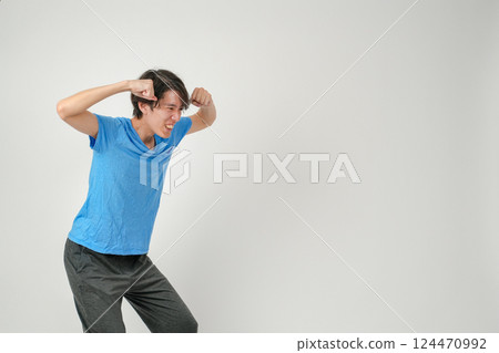 A situation where a weak man is showing off his strength 124470992