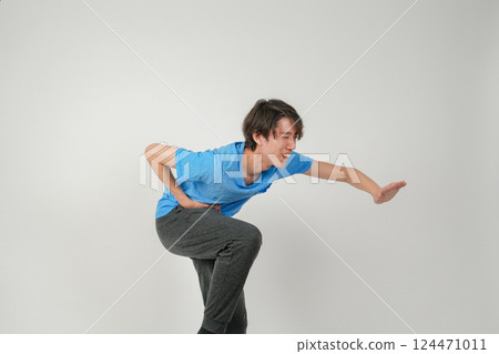 A man with a stomach ache waiting for the toilet to clear 124471011
