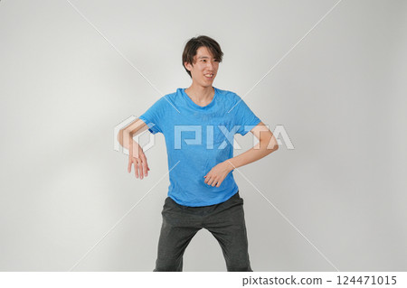 A man in an awkward position 124471015