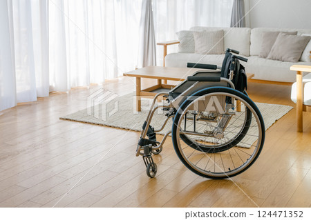 Wheelchair placed in the room 124471352