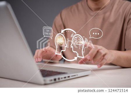 Human and AI interaction in modern technology. A person using a laptop with virtual assistant and deep learning, representing intelligent automation and innovation. digital assistant conversation Human and AI interaction in modern technology. A person using a laptop with virtual assistant and deep learning, representing intelligent automation and innovation. digital assistant conversation 124471514