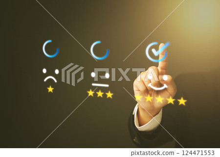 Hand selecting a five star rating on a digital satisfaction survey, symbolizing customer feedback and quality assessment.reviews, and service evaluation for business improvement. 124471553