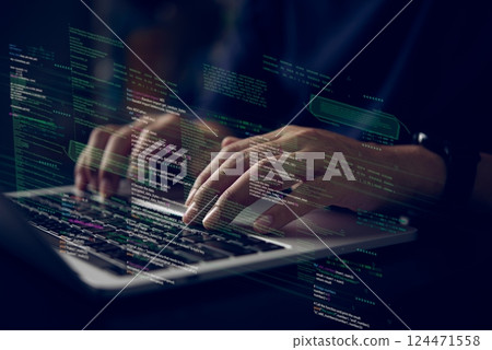Hands typing on laptop with programming code on screen, representing software development. Perfect for coding, IT solutions, digital technology, web applications. 124471558