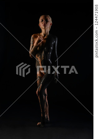 Stunning body art highlighting beauty in a dramatic contrast of colors Stunning body art highlighting beauty in a dramatic contrast of colors 124471908