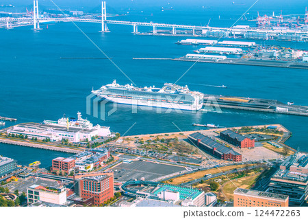 Yokohama cityscape in Japan, overlooking the Diamond Princess and other ships departing. (Europa 2 arrives for the first time) Yokohama cityscape in Japan, overlooking the Diamond Princess and other ships departing. (Europa 2 arrives for the first time) 124472263