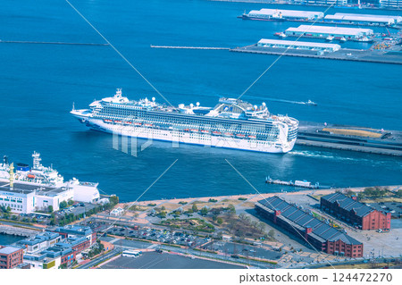 Yokohama cityscape in Japan, overlooking the Diamond Princess and other ships departing. (Europa 2 arrives for the first time) Yokohama cityscape in Japan, overlooking the Diamond Princess and other ships departing. (Europa 2 arrives for the first time) 124472270