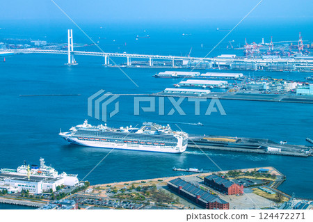 Yokohama cityscape in Japan, overlooking the Diamond Princess and other ships departing. (Europa 2 arrives for the first time) Yokohama cityscape in Japan, overlooking the Diamond Princess and other ships departing. (Europa 2 arrives for the first time) 124472271