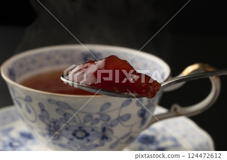 Russian Tea: Put a spoonful of jam into hot tea 124472612