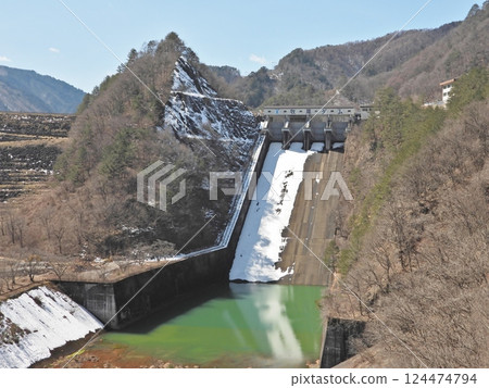 The spillway of Makio Dam in early spring 124474794