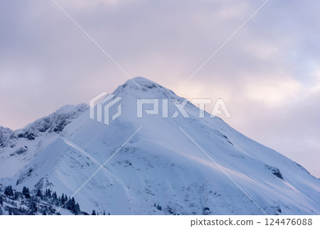 Winter landscape snowy mountain peak in the morning light, in Bavaria, Germany 124476088