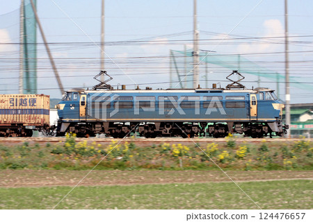 A freight train on the Sanyo Main Line (EF66 Series 0, hauling the new freight refurbished color) A freight train on the Sanyo Main Line (EF66 Series 0, hauling the new freight refurbished color) 124476657