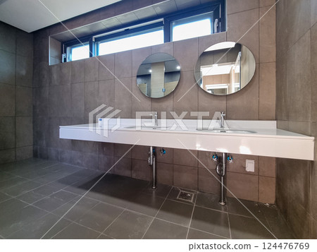 interior of a public toilet interior of a public toilet 124476769