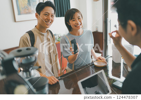 salesperson, shop assistant, person 124478307