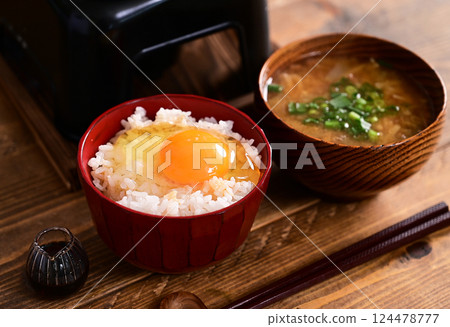 Raw egg on rice and natto soup Raw egg on rice and natto soup 124478777