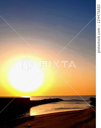 The sun and the sea in the morning 124478882