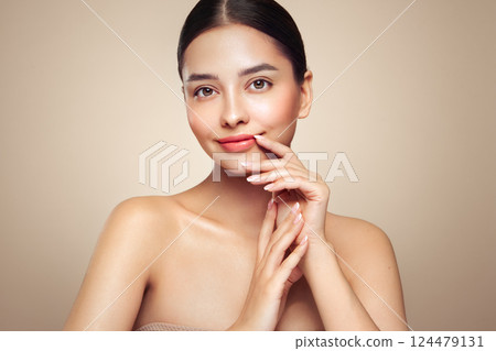 Portrait beautiful young woman with clean fresh skin 124479131