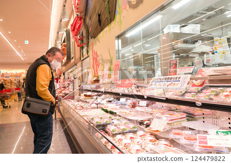 March: Shopping at a local supermarket on a holiday 124479822