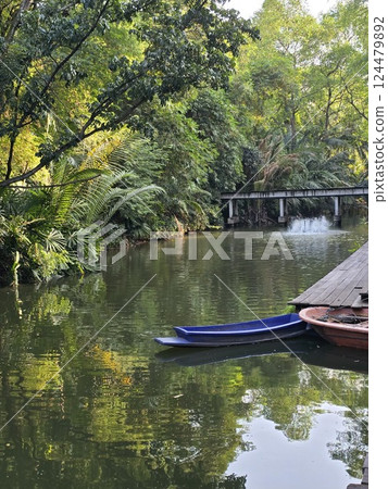 Small boat on a canal in suburb Bangkok 124479892