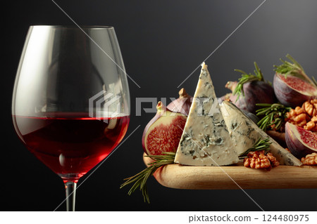 Red wine with blue cheese, figs, walnuts, and rosemary. Red wine with blue cheese, figs, walnuts, and rosemary. 124480975