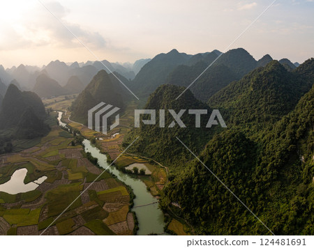 Beautiful sunrise landscape in Phong Nam valley, Amazing scenery landscape at Cao bang province, Northern Vietnam,Travel and nature landscape concept Beautiful sunrise landscape in Phong Nam valley, Amazing scenery landscape at Cao bang province, Northern Vietnam,Travel and nature landscape concept 124481691