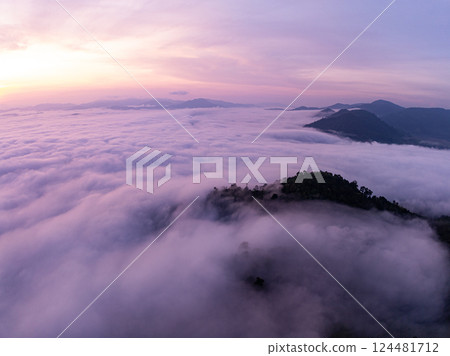 Aerial view Beautiful natural landscape Rainforest mountains in the sunrise or sunset time,Natural scenery tropical forest and fog in asia,Wide angle view drone shot 124481712