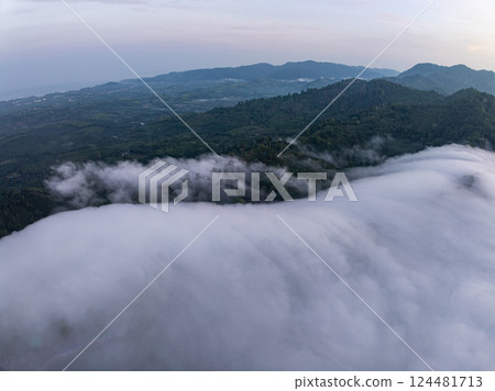 Aerial view Beautiful natural landscape Rainforest mountains in the sunrise or sunset time,Natural scenery tropical forest and fog in asia,Wide angle view drone shot Aerial view Beautiful natural landscape Rainforest mountains in the sunrise or sunset time,Natural scenery tropical forest and fog in asia,Wide angle view drone shot 124481713