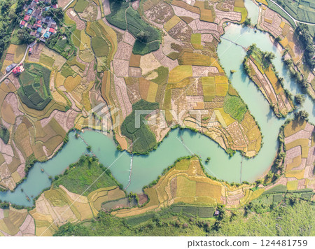 Aerial wide angle view of landscape with rice field at Phong Nam village in Trung Khanh, Cao Bang province,Northern Vietnam Aerial wide angle view of landscape with rice field at Phong Nam village in Trung Khanh, Cao Bang province,Northern Vietnam 124481759