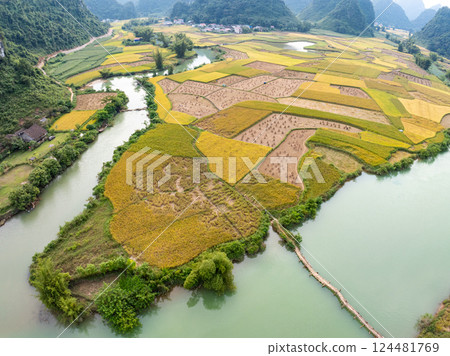 Aerial wide angle view of landscape with rice field at Phong Nam village in Trung Khanh, Cao Bang province,Northern Vietnam Aerial wide angle view of landscape with rice field at Phong Nam village in Trung Khanh, Cao Bang province,Northern Vietnam 124481769