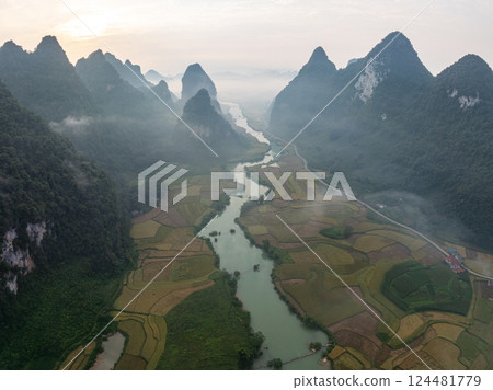 Beautiful sunrise landscape in Phong Nam valley, Amazing scenery landscape at Cao bang province, Northern Vietnam,Travel and nature landscape concept Beautiful sunrise landscape in Phong Nam valley, Amazing scenery landscape at Cao bang province, Northern Vietnam,Travel and nature landscape concept 124481779