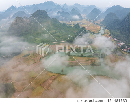 Beautiful sunrise landscape in Phong Nam valley, Amazing scenery landscape at Cao bang province, Northern Vietnam,Travel and nature landscape concept Beautiful sunrise landscape in Phong Nam valley, Amazing scenery landscape at Cao bang province, Northern Vietnam,Travel and nature landscape concept 124481783