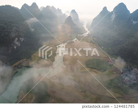 Beautiful sunrise landscape in Phong Nam valley, Amazing scenery landscape at Cao bang province, Northern Vietnam,Travel and nature landscape concept Beautiful sunrise landscape in Phong Nam valley, Amazing scenery landscape at Cao bang province, Northern Vietnam,Travel and nature landscape concept 124481785