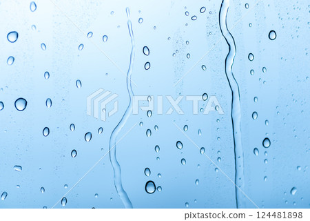Water droplets attached to the glass 124481898