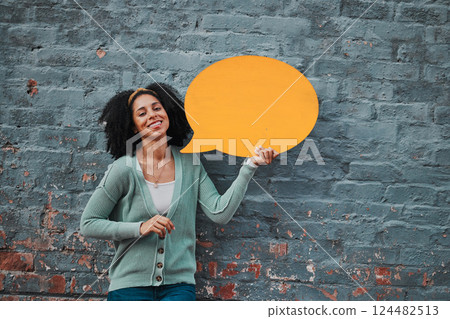 Woman, portrait and brick wall with speech bubble for happy advertising, social media or opinion. Marketing, communication or brand voice of black woman with smile of joy and orange sign mockup. Woman, portrait and brick wall with speech bubble for happy advertising, social media or opinion. Marketing, communication or brand voice of black woman with smile of joy and orange sign mockup. 124482513