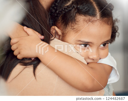Child girl, hug and protection for holding mother, doing embrace and being sad. Black mother, nanny and daughter have quality time, safety and fear being moody, grief and disappointed with consoling. 124482687