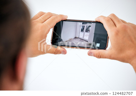 Surveillance, cctv and smartphone screen in hands for door monitor on wall mock up for trust, safety and home insurance security. Man on cellphone technology app online, live streaming camera system Surveillance, cctv and smartphone screen in hands for door monitor on wall mock up for trust, safety and home insurance security. Man on cellphone technology app online, live streaming camera system 124482707