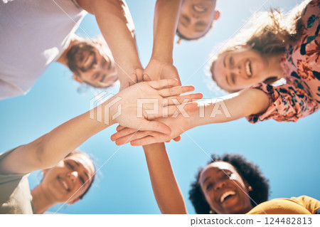 Hands, friends or support in community collaboration, trust or motivation for goals, success or solidarity. Low angle, huddle or circle of smile or happy people, men or women in diversity celebration Hands, friends or support in community collaboration, trust or motivation for goals, success or solidarity. Low angle, huddle or circle of smile or happy people, men or women in diversity celebration 124482813