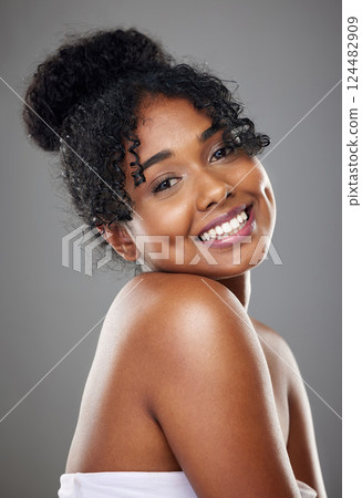 Skincare, beauty and cosmetics for black woman with perfect smile, dermatology and wellness routine against studio background. Jamaica girl portrait for wellness, health and facial for skin that glow Skincare, beauty and cosmetics for black woman with perfect smile, dermatology and wellness routine against studio background. Jamaica girl portrait for wellness, health and facial for skin that glow 124482909