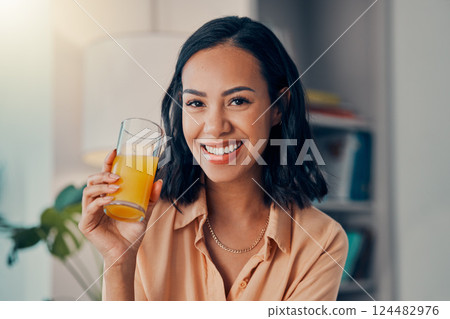 Health, orange juice and wellness woman on a healthy diet for nutrition, vitamin c and happiness with drink in glass in house. Portrait of female drinking morning fruit beverage for breakfast energy Health, orange juice and wellness woman on a healthy diet for nutrition, vitamin c and happiness with drink in glass in house. Portrait of female drinking morning fruit beverage for breakfast energy 124482976