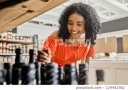 Woman in supermarket, groceries and sustainability, shopping food to support eco friendly local small business. Vegan choice grocery store with low carbon footprint and sustainable healthy lifestyle. Woman in supermarket, groceries and sustainability, shopping food to support eco friendly local small business. Vegan choice grocery store with low carbon footprint and sustainable healthy lifestyle. 124482982