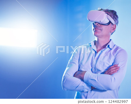 VR, metaverse or senior man with futuristic technology, 3d glasses or virtual reality cyberspace for digital innovation in studio. Gaming, online gamer or cyber internet space for creative thinking 124482997