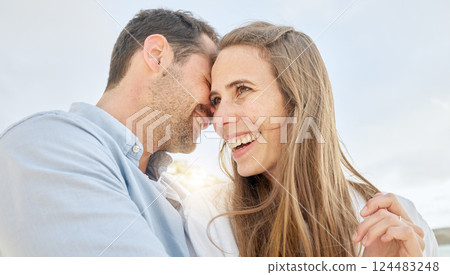 Love, happy and vacation with a couple on a date, bonding during summer while laughing or joking together. Sky, travel and smile with a man and woman enjoying a romantic holiday outside in the day 124483248