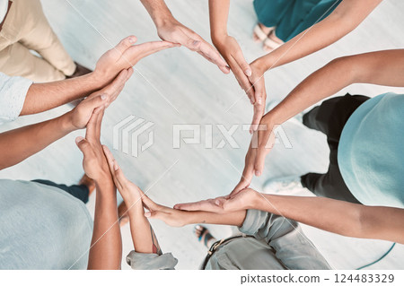 Team building, support and business people with hands in a circle for partnership, collaboration and teamwork at work. Corporate workers with a mission, community or solidarity for trust from above Team building, support and business people with hands in a circle for partnership, collaboration and teamwork at work. Corporate workers with a mission, community or solidarity for trust from above 124483329