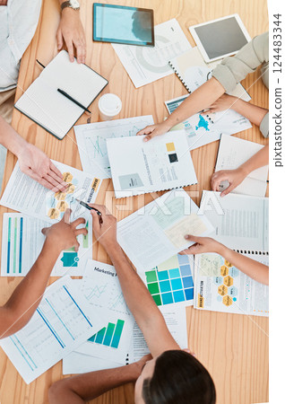 Finance, documents and meeting with a business team at a table in an office boardroom for planning from above. Accounting, growth and investment with a financial group working together in the office 124483344