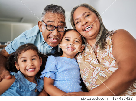 Black family, grandparents and portrait with children while happy, love and bonding in home together. Elderly, man and woman with kids, girl and happiness for smile, care and vacation in living room Black family, grandparents and portrait with children while happy, love and bonding in home together. Elderly, man and woman with kids, girl and happiness for smile, care and vacation in living room 124483428