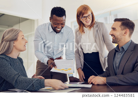 Diversity, team and in meeting for group project, planning and strategy together at desk for brainstorming in office. Teamwork, business or conversation for startup company, conversation or workspace 124483581