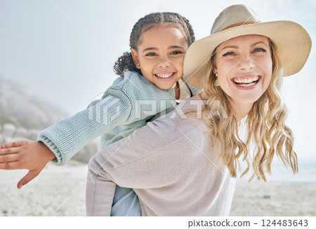 Beach, foster and portrait with piggy back bonding with black child on California holiday. Adoption, vacation and love in interracial family with happy smile of kid and mom at the ocean. 124483643