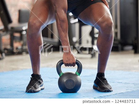 Gym, strong and fitness hand with kettlebell for body builder training, workout and cardio. Bodybuilder, exercise and muscle strength and endurance practice for athlete man at wellness club. Gym, strong and fitness hand with kettlebell for body builder training, workout and cardio. Bodybuilder, exercise and muscle strength and endurance practice for athlete man at wellness club. 124483711